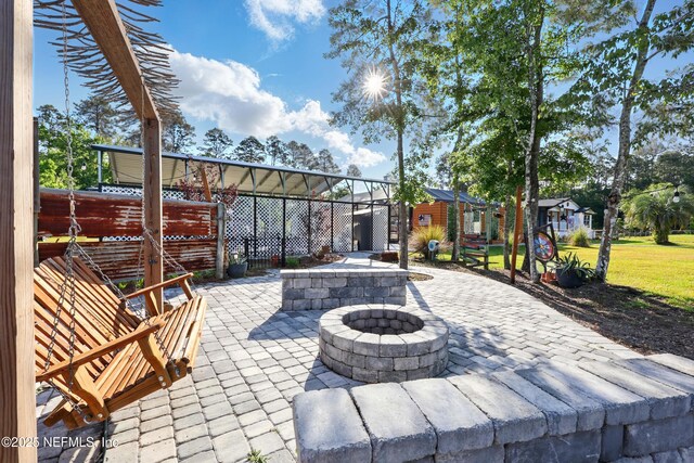 1417 Marlee Rd, Saint Johns, FL 32259 - view of patio / terrace featuring an outdoor fire pit and fence
