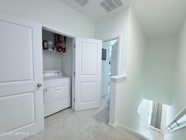 laundry room with laundry area, washer / clothes dryer, visible vents, and light carpet