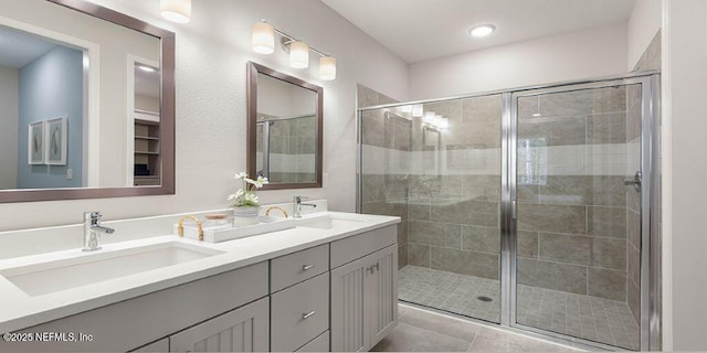166 Whistling Straits Dr, Saint Johns, FL 32259 - bathroom featuring double vanity, a shower stall, tile patterned flooring, and a sink