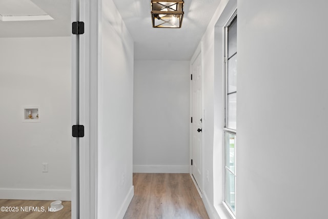 360 Varella Ave, Saint Augustine, FL 32084 - hall with wood finished floors and baseboards