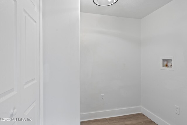 360 Varella Ave, Saint Augustine, FL 32084 - laundry area featuring washer hookup, wood finished floors, and baseboards