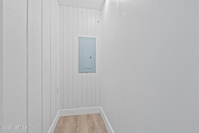 360 Varella Ave, Saint Augustine, FL 32084 - detailed view of electric panel, wood finished floors, baseboards, and wooden walls