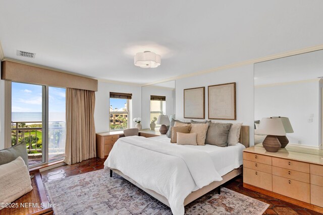 948 Spinnakers Reach Dr, Ponte Vedra Beach, FL 32082 - bedroom featuring crown molding and access to exterior