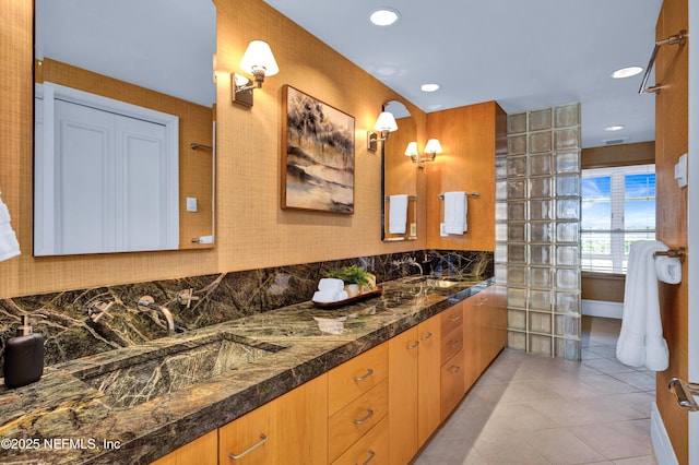 948 Spinnakers Reach Dr, Ponte Vedra Beach, FL 32082 - bathroom with double vanity, tile patterned floors, decorative backsplash, and recessed lighting