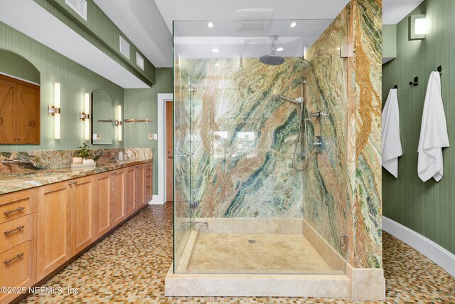 948 Spinnakers Reach Dr, Ponte Vedra Beach, FL 32082 - bathroom featuring a marble finish shower, vanity, recessed lighting, and baseboards