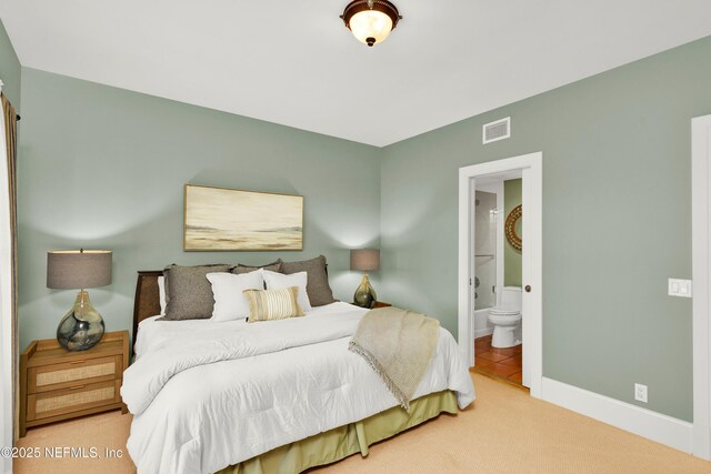 948 Spinnakers Reach Dr, Ponte Vedra Beach, FL 32082 - bedroom with carpet flooring, baseboards, and connected bathroom