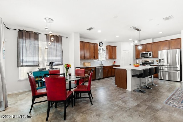 3753 Old Hickory Ln, Orange Park, FL 32065 - dining space with plenty of natural light, recessed lighting, and visible vents