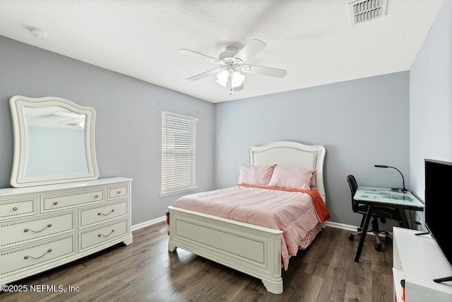 3753 Old Hickory Ln, Orange Park, FL 32065 - bedroom featuring baseboards, a ceiling fan, dark wood finished floors, and visible vents