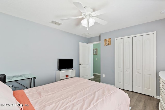 3753 Old Hickory Ln, Orange Park, FL 32065 - bedroom featuring ceiling fan, baseboards, wood finished floors, visible vents, and a closet