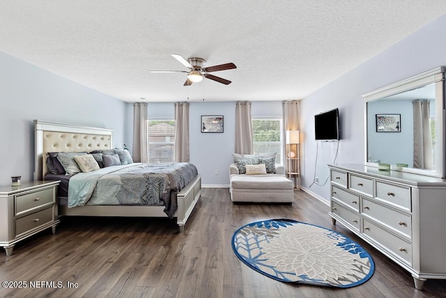 3753 Old Hickory Ln, Orange Park, FL 32065 - bedroom featuring baseboards, a ceiling fan, a textured ceiling, and dark wood-type flooring