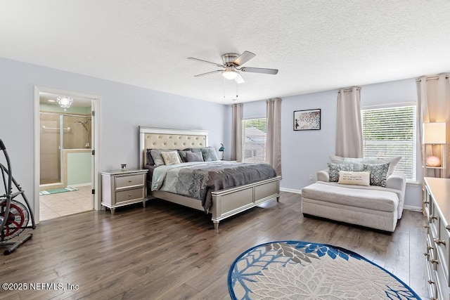 3753 Old Hickory Ln, Orange Park, FL 32065 - bedroom with a textured ceiling, multiple windows, and wood finished floors