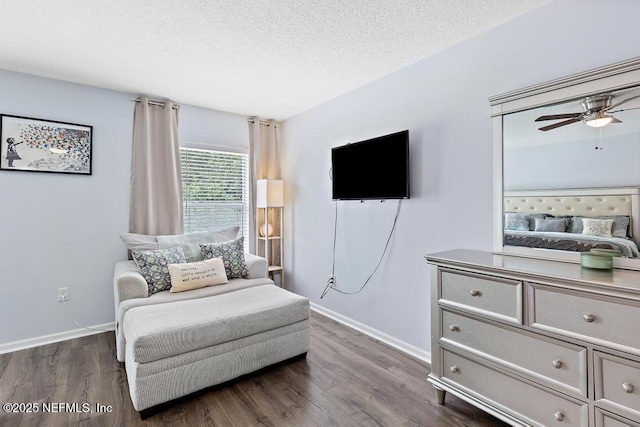 3753 Old Hickory Ln, Orange Park, FL 32065 - bedroom featuring baseboards, a textured ceiling, and dark wood-type flooring
