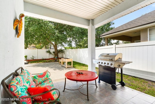 3753 Old Hickory Ln, Orange Park, FL 32065 - view of patio featuring a fenced backyard and a grill