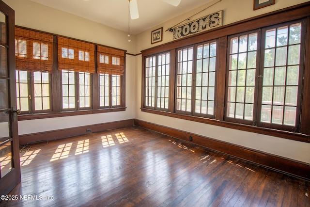 703 Emmett St, Palatka, FL 32177 - unfurnished room featuring ceiling fan, hardwood / wood-style floors, and baseboards