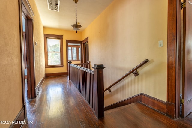 703 Emmett St, Palatka, FL 32177 - stairs with visible vents, baseboards, and wood-type flooring