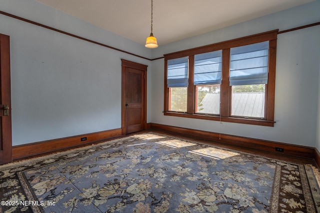 703 Emmett St, Palatka, FL 32177 - spare room featuring baseboards
