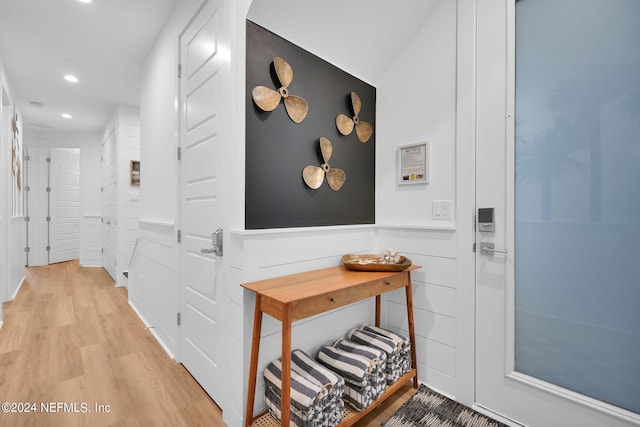 hall with recessed lighting and light wood-type flooring