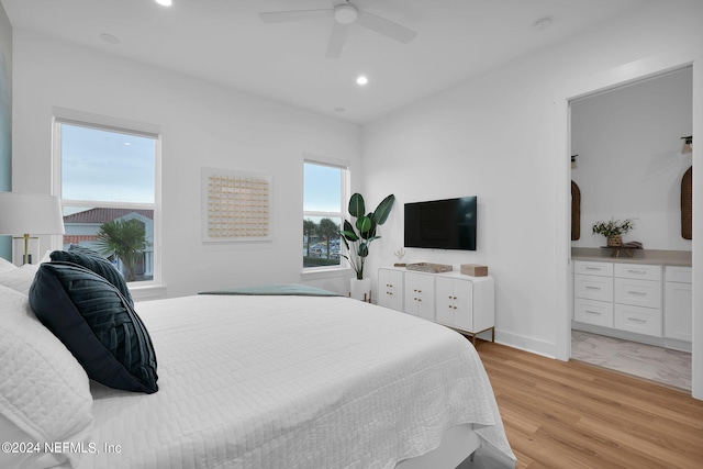 bedroom featuring recessed lighting, a ceiling fan, baseboards, and light wood-style floors
