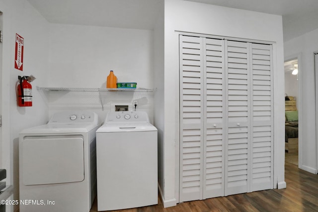 237 Riberia St, Saint Augustine, FL 32084 - laundry room with baseboards, washer and clothes dryer, and wood finished floors