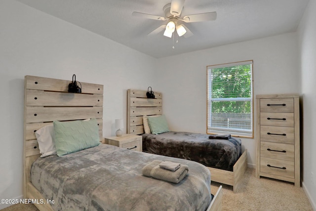 237 Riberia St, Saint Augustine, FL 32084 - bedroom featuring baseboards, a ceiling fan, and light colored carpet