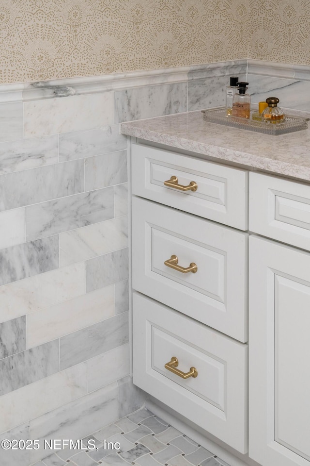 1478 Riverplace Blvd Unit 1008, Jacksonville, FL 32207 - bathroom view of wallpapered walls, wainscoting, and vanity