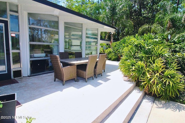 view of patio featuring outdoor dining space