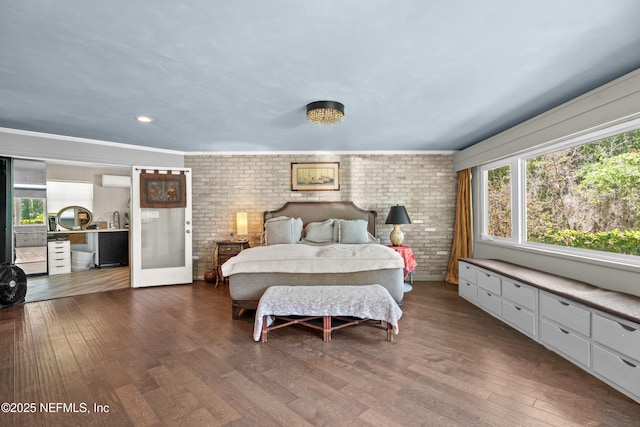 118 Herja Acre Ln, Palatka, FL 32177 - bedroom featuring brick wall and wood finished floors