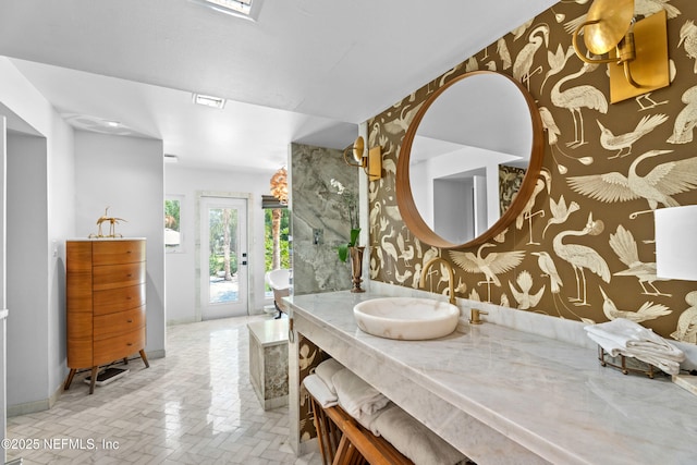 118 Herja Acre Ln, Palatka, FL 32177 - bathroom featuring wallpapered walls, brick patterned flooring, vanity, baseboards, and a tub