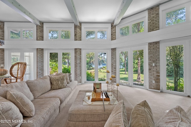 118 Herja Acre Ln, Palatka, FL 32177 - sunroom / solarium featuring french doors, beam ceiling, and plenty of natural light