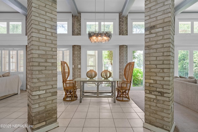 118 Herja Acre Ln, Palatka, FL 32177 - detailed view of ornate columns, beamed ceiling, and a chandelier