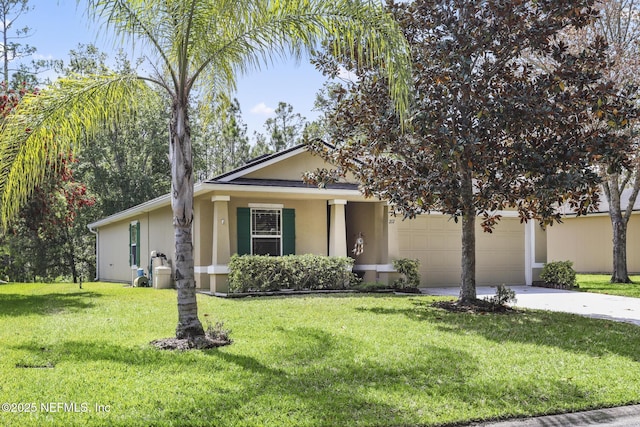217 N Twin Maple Rd, Saint Augustine, FL 32084 - single story home featuring stucco siding, concrete driveway, a front yard, and a garage