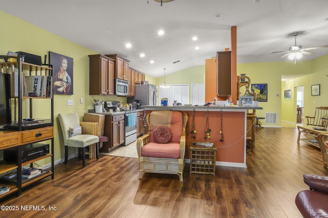 217 N Twin Maple Rd, Saint Augustine, FL 32084 - kitchen featuring dark wood-style floors, visible vents, stainless steel appliances, and ceiling fan