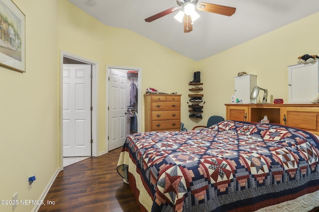 217 N Twin Maple Rd, Saint Augustine, FL 32084 - bedroom with dark wood finished floors, vaulted ceiling, ceiling fan, baseboards, and a spacious closet
