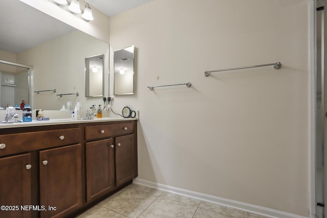 217 N Twin Maple Rd, Saint Augustine, FL 32084 - full bath with tile patterned floors, baseboards, an enclosed shower, and vanity