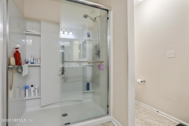 217 N Twin Maple Rd, Saint Augustine, FL 32084 - bathroom featuring a shower stall, tile patterned floors, and baseboards