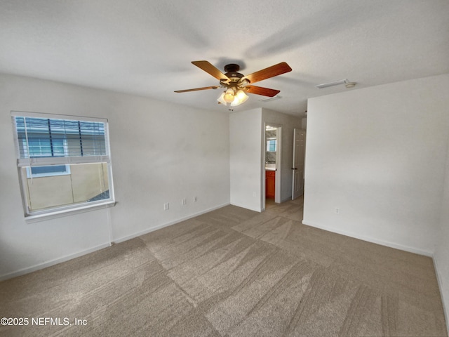 8550 Argyle Business Loop Unit 903, Jacksonville, FL 32244 - spare room with a ceiling fan, carpet, and baseboards