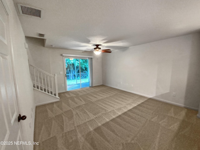8550 Argyle Business Loop Unit 903, Jacksonville, FL 32244 - carpeted spare room featuring stairs, visible vents, ceiling fan, and baseboards