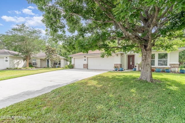 4917 Cypress Links Blvd, Elkton, FL 32033 - view of front facade with concrete driveway, stucco siding, stone siding, and a garage