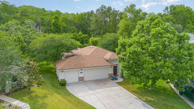 4917 Cypress Links Blvd, Elkton, FL 32033 - view from above of property with a heavily wooded area
