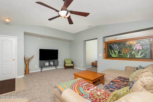 4917 Cypress Links Blvd, Elkton, FL 32033 - living room featuring lofted ceiling, carpet, ceiling fan, and baseboards