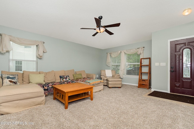 4917 Cypress Links Blvd, Elkton, FL 32033 - living room featuring a ceiling fan, healthy amount of natural light, and carpet