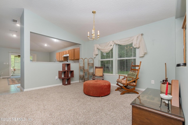 4917 Cypress Links Blvd, Elkton, FL 32033 - living area featuring carpet, a chandelier, baseboards, vaulted ceiling, and a textured ceiling