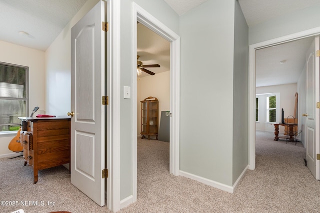 4917 Cypress Links Blvd, Elkton, FL 32033 - hall with light carpet and baseboards