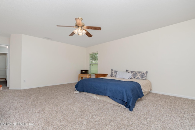 4917 Cypress Links Blvd, Elkton, FL 32033 - carpeted bedroom featuring baseboards and ceiling fan