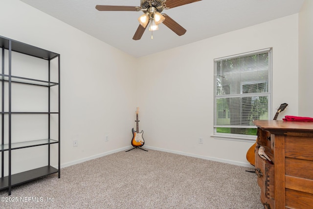4917 Cypress Links Blvd, Elkton, FL 32033 - bedroom featuring carpet floors, baseboards, and a ceiling fan