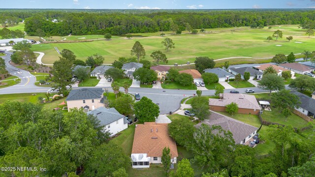 4917 Cypress Links Blvd, Elkton, FL 32033 - view of property location featuring a golf course, nearby suburban area, and a heavily wooded area