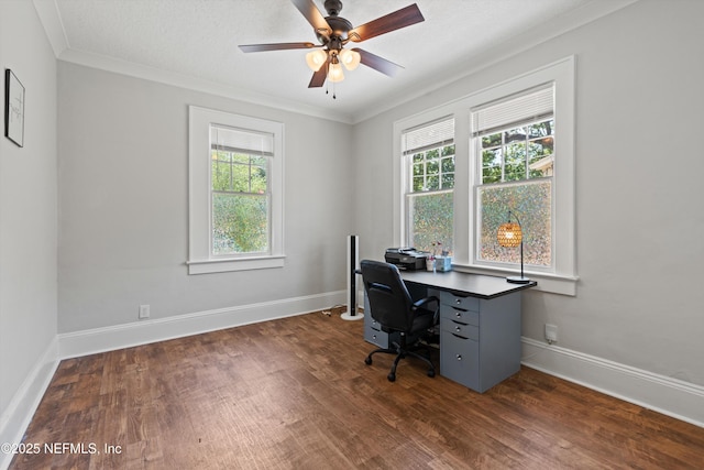 home office with baseboards, ornamental molding, a ceiling fan, and wood finished floors