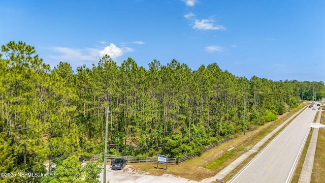 drone / aerial view of a heavily wooded area