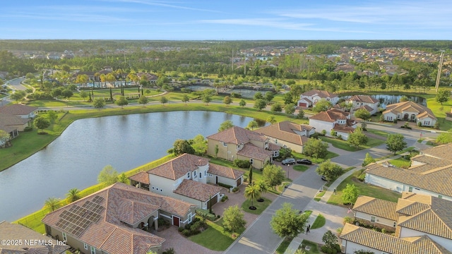 aerial view featuring a water view and a residential view