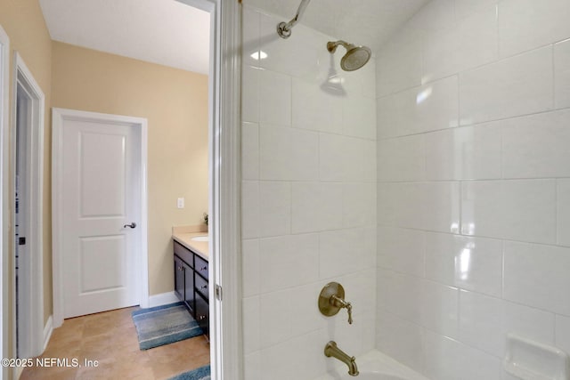 full bath featuring tub / shower combination, vanity, and baseboards